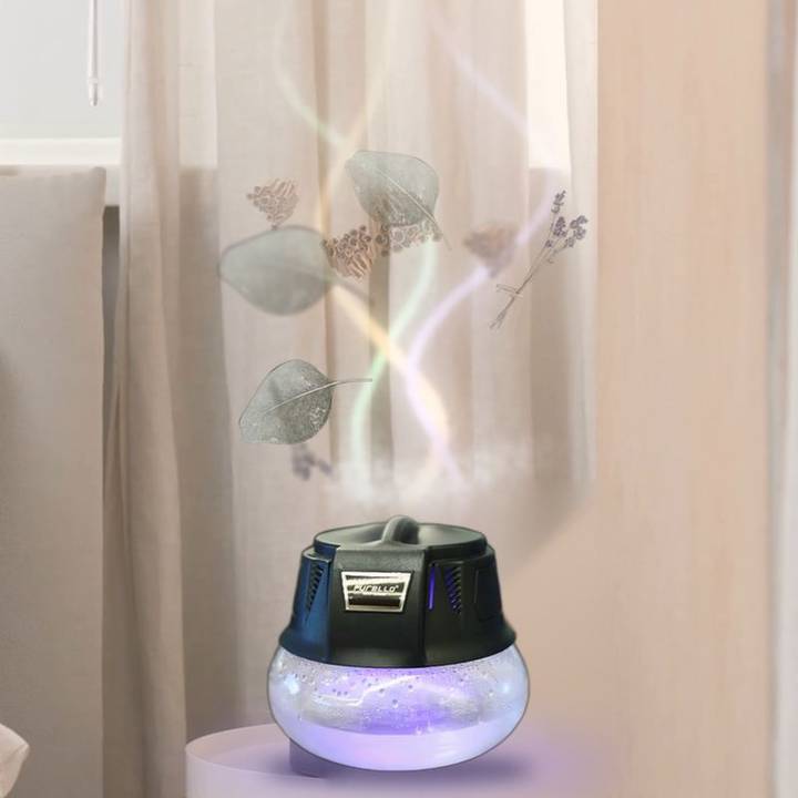 Diffuseur d'huiles essentielles Purello sur une table de nuit, parfum d'eucalyptus et de lavande diffusé à froid